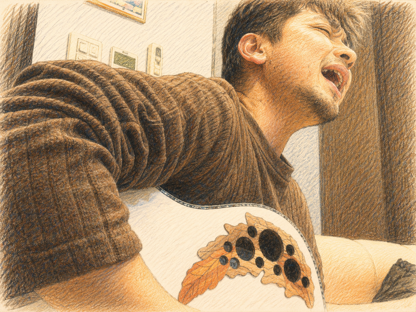 ギターを弾き歌う姿